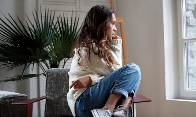A woman reflecting on whether the Women's Wellness IOP is right for her